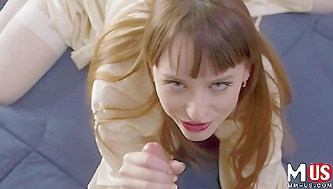 Busty redhead in stockings shows her big ass and cock