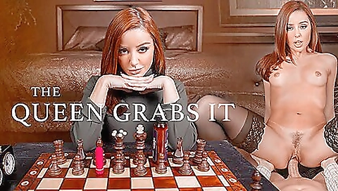 Busty brunette is doing a doggy pose in front of a big screen