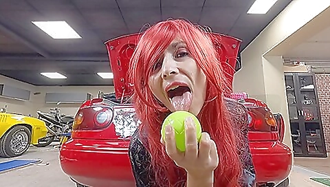 Redhead amateur video showing her sucking a vibrator and dildo