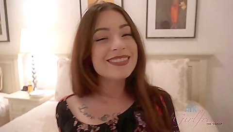 Busty brunette with a shaved pussy fucks a guy on the sofa