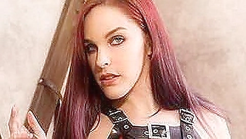 Tattooed redhead gets her pussy penetrated by a friend