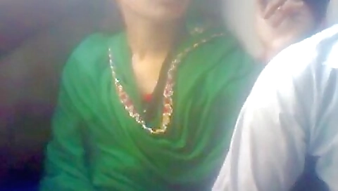 Asian brunette on a bus riding in a crowded bus one