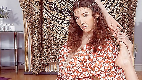 Red-haired porn actress is playing with her dildo in vr